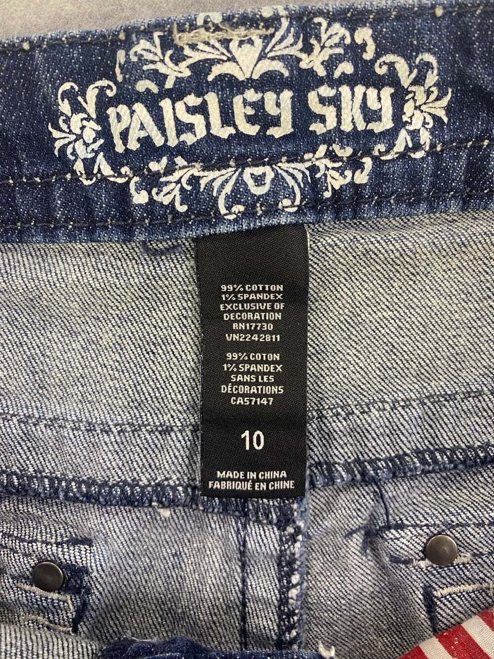 Paisley Sky Denim Shorts with American Flag Patch and Rhinestone Embellishments - Picture 8 of 9